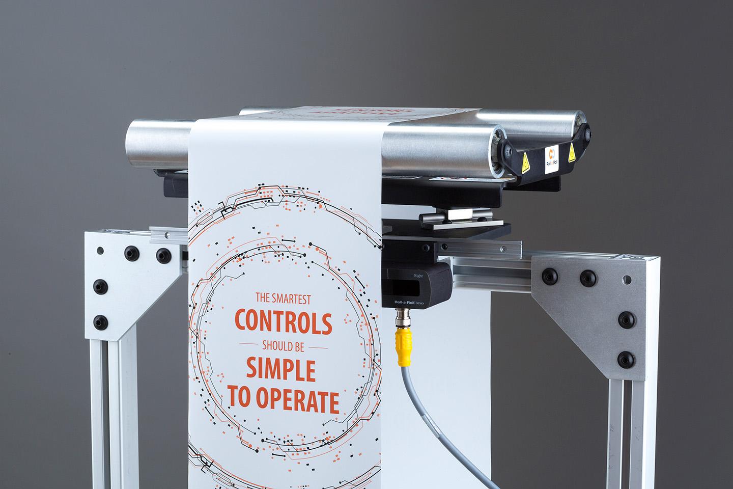 Web guide with a edge sensor
